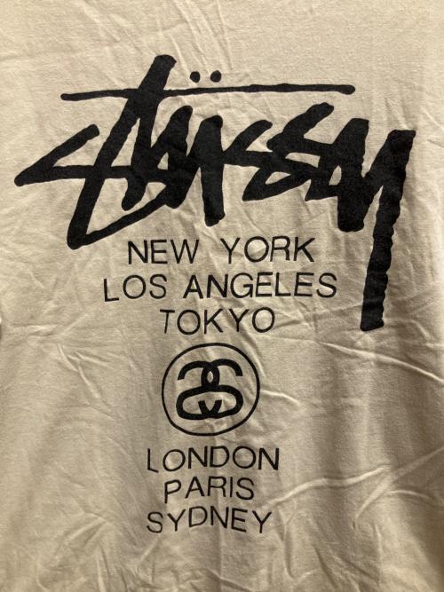 stussy（ステューシー）stussy (ステューシー) ワールドツアーT 半袖Tシャツ ベージュ サイズ:SIZE Lの古着・服飾アイテム