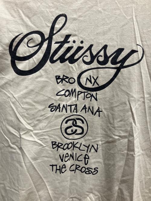 stussy（ステューシー）stussy (ステューシー) ワールドツアーT 半袖Tシャツ ベージュ サイズ:SIZE Lの古着・服飾アイテム