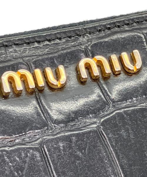 MIU MIU（ミュウミュウ）MIU MIU (ミュウミュウ) ラウンドジップ長財布 ブラウンの古着・服飾アイテム