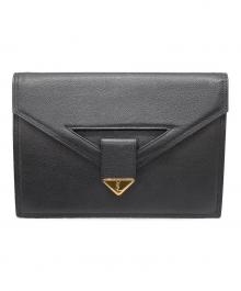 Yves Saint Laurent（イヴサンローラン）の古着「クラッチバッグ」｜ブラック×ゴールド