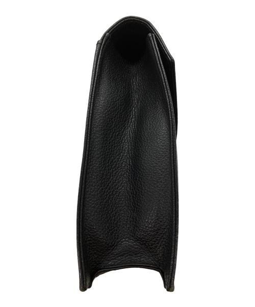 Yves Saint Laurent（イヴサンローラン）Yves Saint Laurent (イヴサンローラン) クラッチバッグ ブラック×ゴールドの古着・服飾アイテム