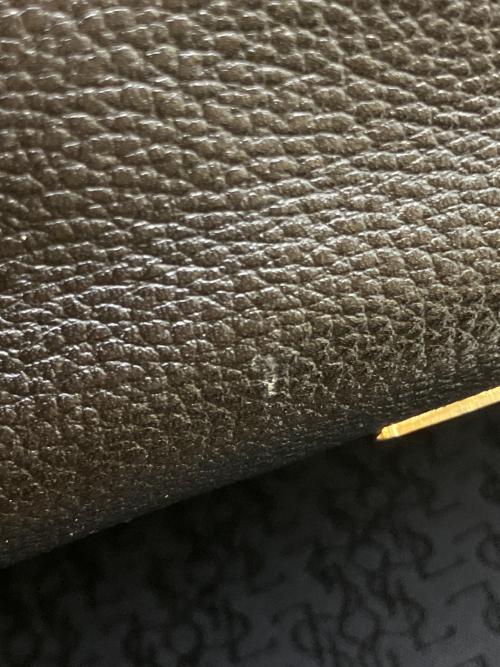 Yves Saint Laurent（イヴサンローラン）Yves Saint Laurent (イヴサンローラン) クラッチバッグ ブラック×ゴールドの古着・服飾アイテム