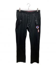 DIESEL（ディーゼル）の古着「ジャージパンツ」｜ブラック×レッド