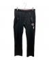 DIESEL（ディーゼル）の古着「ジャージパンツ」｜ブラック×レッド