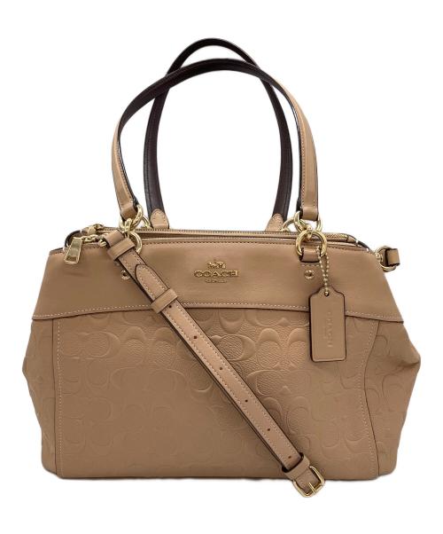COACH（コーチ）COACH (コーチ) シグネチャー　2WAYバッグ ベージュの古着・服飾アイテム