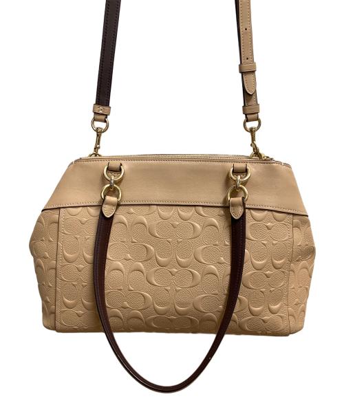 COACH（コーチ）COACH (コーチ) シグネチャー　2WAYバッグ ベージュの古着・服飾アイテム