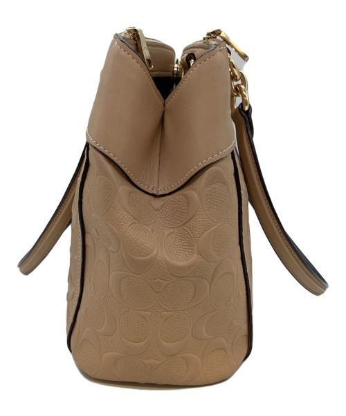 COACH（コーチ）COACH (コーチ) シグネチャー　2WAYバッグ ベージュの古着・服飾アイテム