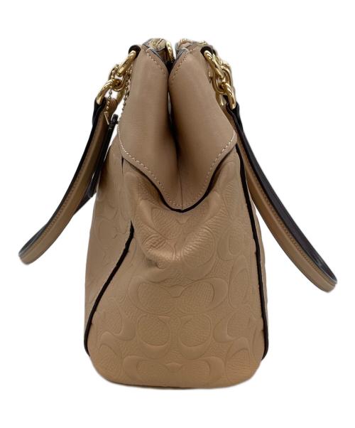 COACH（コーチ）COACH (コーチ) シグネチャー　2WAYバッグ ベージュの古着・服飾アイテム