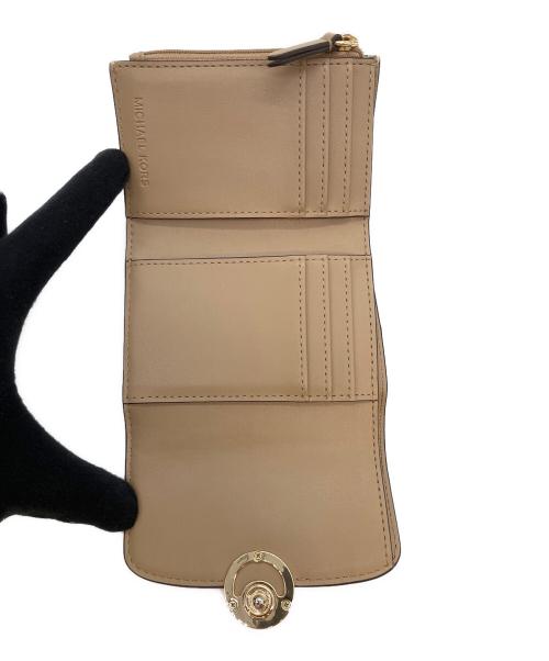 MICHAEL KORS（マイケルコース）MICHAEL KORS (マイケルコース) コンパクトウォレット アイボリーの古着・服飾アイテム