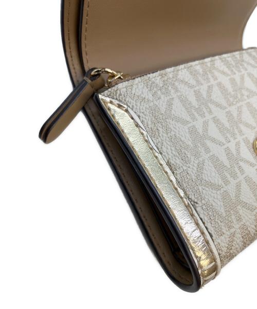 MICHAEL KORS（マイケルコース）MICHAEL KORS (マイケルコース) コンパクトウォレット アイボリーの古着・服飾アイテム