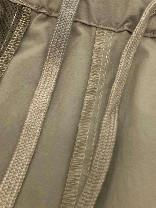 super.natural（スーパーナチュラル）super.natural (スーパーナチュラル) UGL (ウルトラグッドラック) RID SHELL PANTS ナイロンパンツ カーキ サイズ:SIZE L 未使用品の古着・服飾アイテム
