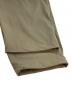 中古・古着 super.natural (スーパーナチュラル) UGL (ウルトラグッドラック) RID SHELL PANTS ナイロンパンツ カーキ サイズ:SIZE L 未使用品：8000円