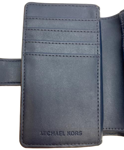 MICHAEL KORS（マイケルコース）MICHAEL KORS (マイケルコース) JET SET TRAVEL 2つ折り財布 ブルーの古着・服飾アイテム