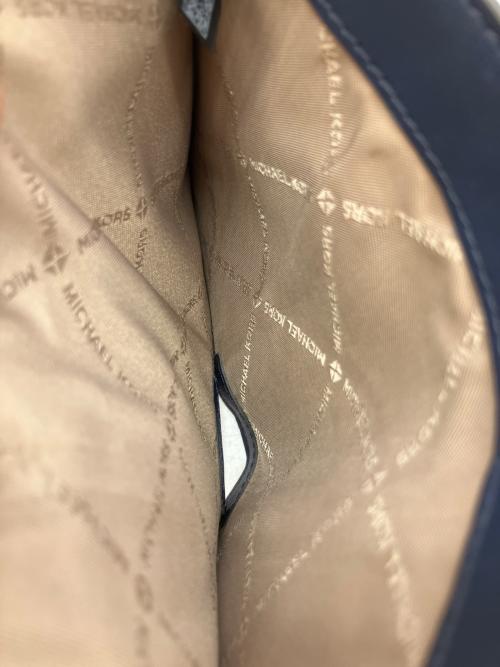 MICHAEL KORS（マイケルコース）MICHAEL KORS (マイケルコース) JET SET TRAVEL 2つ折り財布 ブルーの古着・服飾アイテム