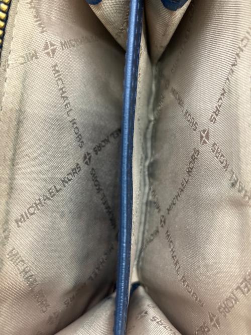 MICHAEL KORS（マイケルコース）MICHAEL KORS (マイケルコース) JET SET TRAVEL 2つ折り財布 ブルーの古着・服飾アイテム