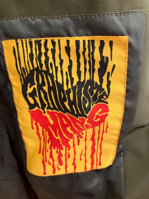 GRAPHISTE MAN.G（グラフィスト マンジー）GRAPHISTE MAN.G (グラフィスト マンジー) トレンチコート グリーン サイズ:SIZE Freeの古着・服飾アイテム