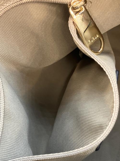 FURLA（フルラ）FURLA (フルラ) アテナ 2WAYドローストリングバッグ アイボリーの古着・服飾アイテム