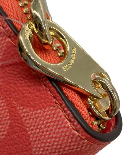 COACH（コーチ）COACH (コーチ) シグネチャー　ロング ジップ アラウンド ウォレット ショッキングピンク 未使用品の古着・服飾アイテム