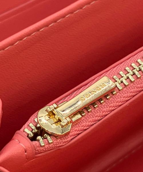 COACH（コーチ）COACH (コーチ) シグネチャー　ロング ジップ アラウンド ウォレット ショッキングピンク 未使用品の古着・服飾アイテム