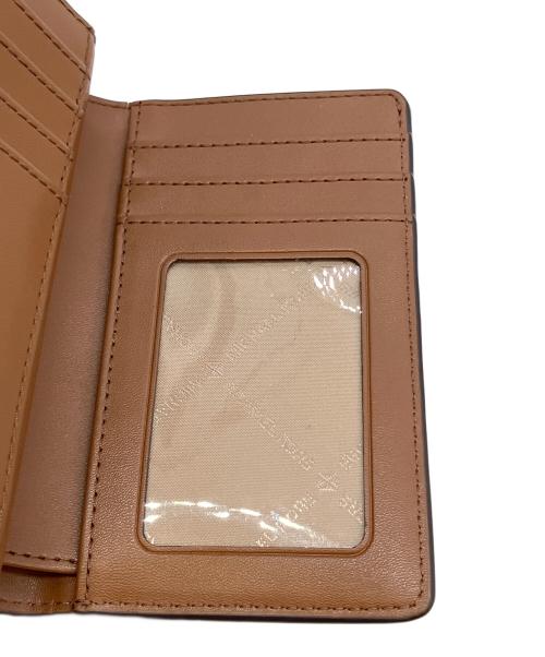 MICHAEL KORS（マイケルコース）MICHAEL KORS (マイケルコース) 2つ折り財布 アイボリーの古着・服飾アイテム