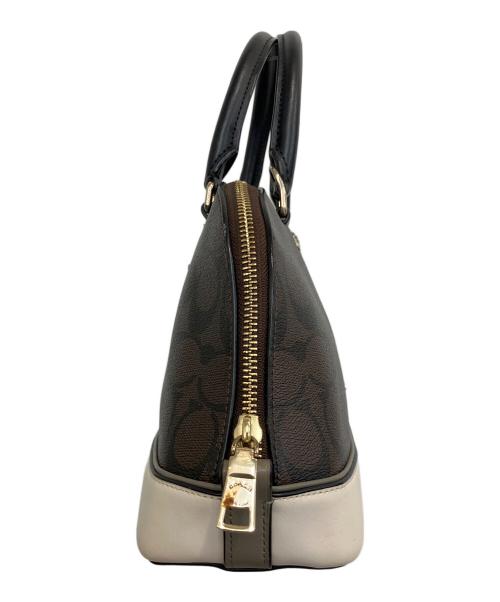 COACH（コーチ）COACH (コーチ) シグネチャー　ミニ シエラ サッチェル ブラウン×アイボリーの古着・服飾アイテム