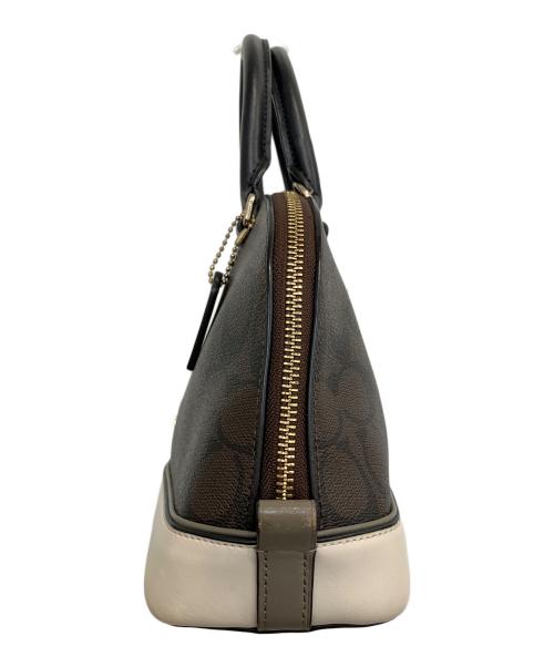 COACH（コーチ）COACH (コーチ) シグネチャー　ミニ シエラ サッチェル ブラウン×アイボリーの古着・服飾アイテム