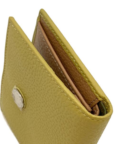IACUCCI（イアクッチ）IACUCCI (イアクッチ) 2つ折り財布 イエローの古着・服飾アイテム