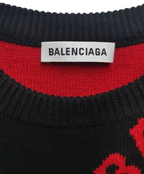 BALENCIAGA（バレンシアガ）BALENCIAGA (バレンシアガ) 総柄BALENCIAGAスラッシュロゴ付クルーネックニット ブラック×レッド サイズ:XSの古着・服飾アイテム