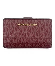 MICHAEL KORS（マイケル・コース）の古着「2つ折り財布」｜ボルドー