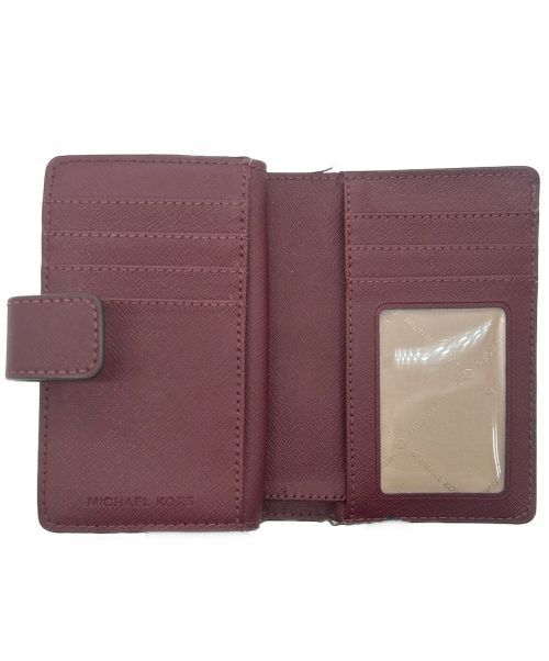 MICHAEL KORS（マイケル・コース）MICHAEL KORS (マイケルコース) 2つ折り財布 ボルドーの古着・服飾アイテム