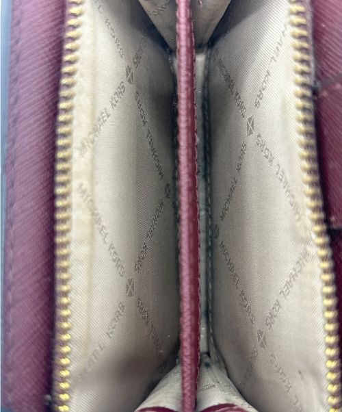 MICHAEL KORS（マイケル・コース）MICHAEL KORS (マイケルコース) 2つ折り財布 ボルドーの古着・服飾アイテム
