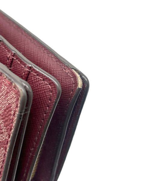 MICHAEL KORS（マイケル・コース）MICHAEL KORS (マイケルコース) 2つ折り財布 ボルドーの古着・服飾アイテム