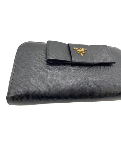 PRADA（プラダ）PRADA (プラダ) リボンラウンドファスナー長財布 ブラックの古着・服飾アイテム