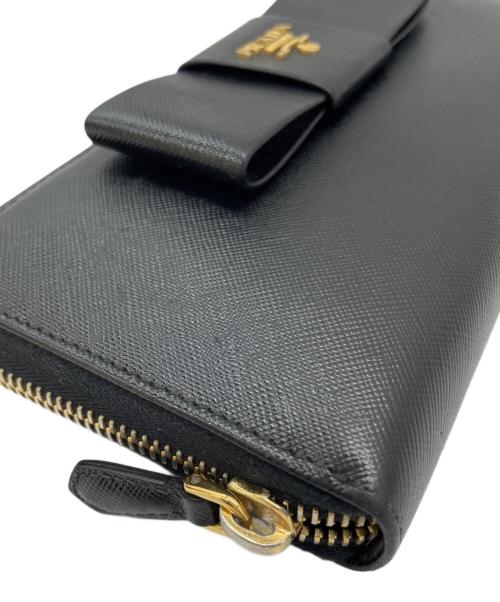 PRADA（プラダ）PRADA (プラダ) リボンラウンドファスナー長財布 ブラックの古着・服飾アイテム