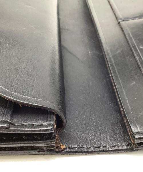 ISAMU KATAYAMA BACKLASH（イサムカタヤマ・バックラッシュ）ISAMU KATAYAMA BACKLASH (イサムカタヤマ・バックラッシュ) 長財布 ブラックの古着・服飾アイテム