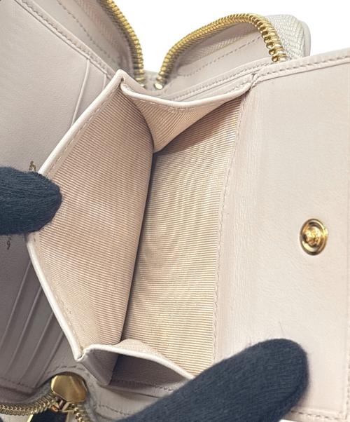 Salvatore Ferragamo（サルヴァトーレ フェラガモ）Salvatore Ferragamo (サルヴァトーレ フェラガモ) 2つ折り財布 ライトピンクの古着・服飾アイテム