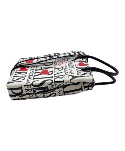 BALENCIAGA（バレンシアガ）BALENCIAGA (バレンシアガ) ショッピングフォンホルダー / ボンジュールパリ ホワイトの古着・服飾アイテム