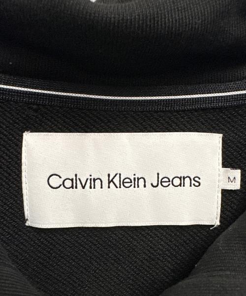 Calvin Klein Jeans（カルバンクラインジーンズ）Calvin Klein Jeans (カルバンクラインジーンズ) プルオーバーパーカー ブラック サイズ:Mの古着・服飾アイテム