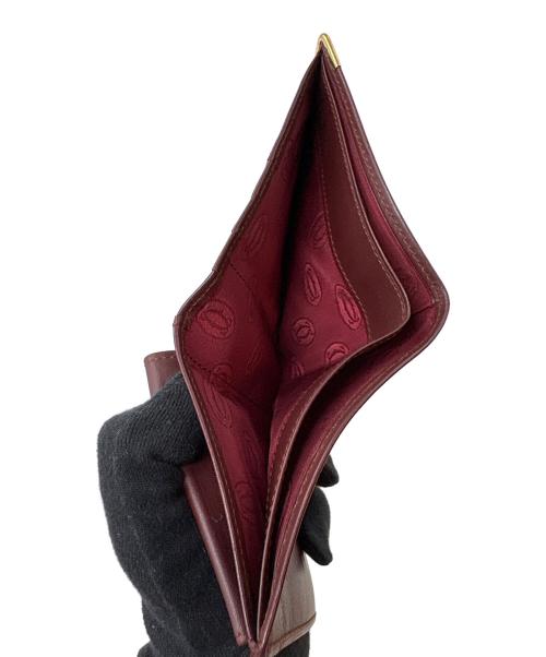 Cartier（カルティエ）Cartier (カルティエ) 2つ折り財布/マストライン ボルドーの古着・服飾アイテム