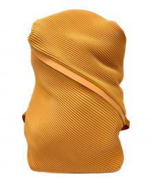 PLEATS PLEASE（プリーツプリーズ）の古着「リュック」｜オレンジ