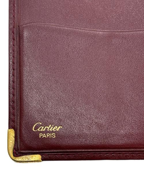 Cartier（カルティエ）Cartier (カルティエ) 札入れ ボルドーの古着・服飾アイテム