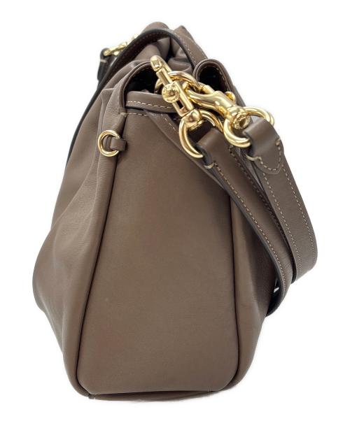 COACH（コーチ）COACH (コーチ) フェイドローストリングバッグ ブラウンの古着・服飾アイテム
