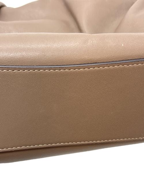 COACH（コーチ）COACH (コーチ) フェイドローストリングバッグ ブラウンの古着・服飾アイテム