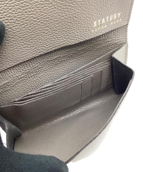 STATUSY（ステータシー）STATUSY (ステータシー) STATUSY　長財布 グレーの古着・服飾アイテム