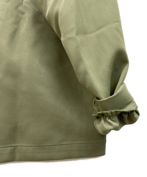 NEW BALANCE（ニューバランス）NEW BALANCE (ニューバランス) ロングスリーブウーブンシャツ グリーン サイズ:M 未使用品の古着・服飾アイテム