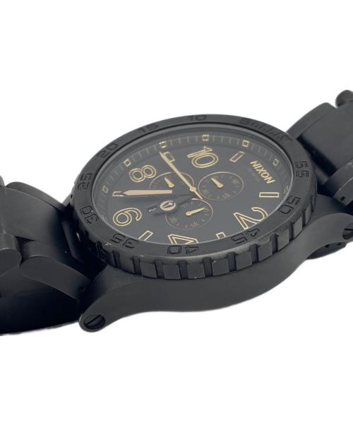 NIXON（ニクソン）NIXON (ニクソン) クロノグラフ ブラック×ゴールドの古着・服飾アイテム
