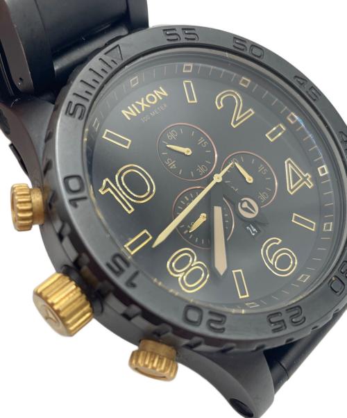 NIXON（ニクソン）NIXON (ニクソン) クロノグラフ ブラック×ゴールドの古着・服飾アイテム