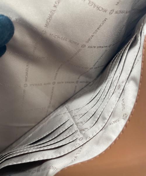 MICHAEL KORS（マイケル・コース）MICHAEL KORS (マイケルコース) クラッチバッグ ブラウンの古着・服飾アイテム