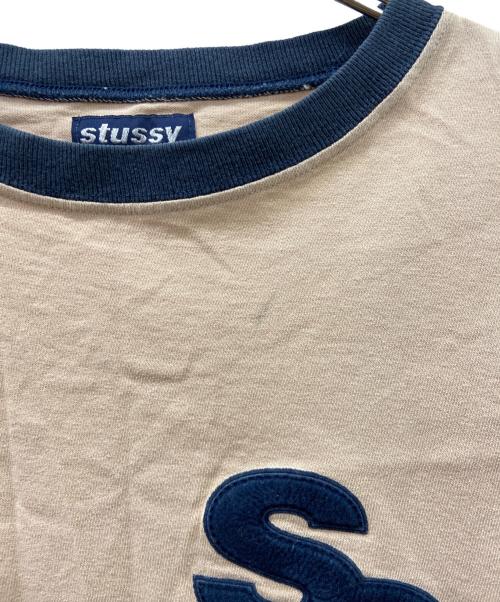 stussy（ステューシー）stussy (ステューシー) ロゴリンガーカットソー ベージュ×ネイビー サイズ:Mの古着・服飾アイテム