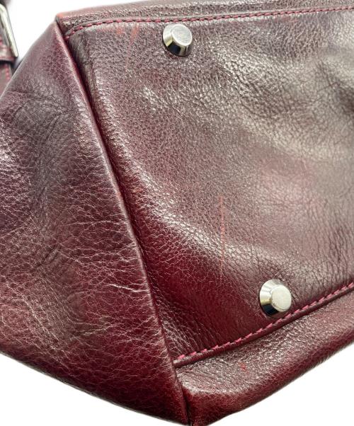 totem re vooo（トーテムリボー）totem re vooo (トーテムリボー) ボストンバッグ ボルドーの古着・服飾アイテム